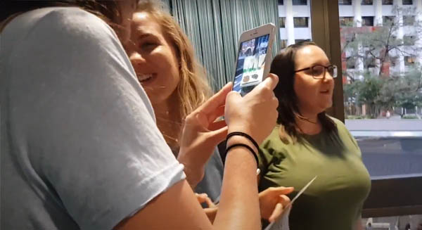 girl holding mobile phone
