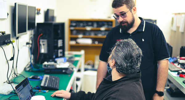 Computer Technicians explaining project