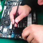 Internal Laptop Battery Being Replaced by Technician