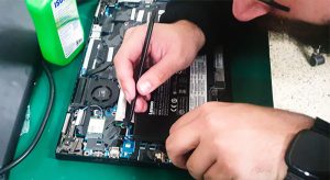 Internal Laptop Battery Being Replaced by Technician