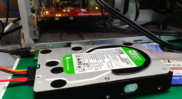 faulty 3.5" Mechanical Hard Drive with data being recovered with PC-3000 Data Recovery System